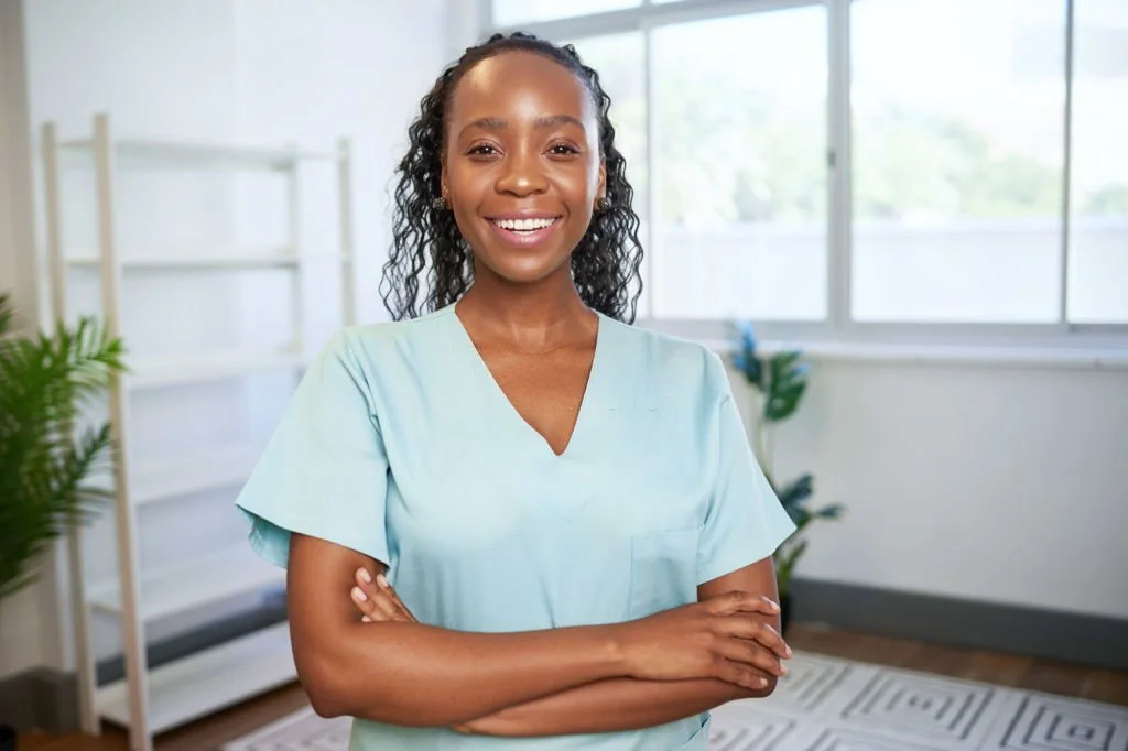 Black woman wearing scrubs