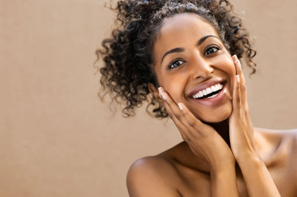 Black woman showing her teeth