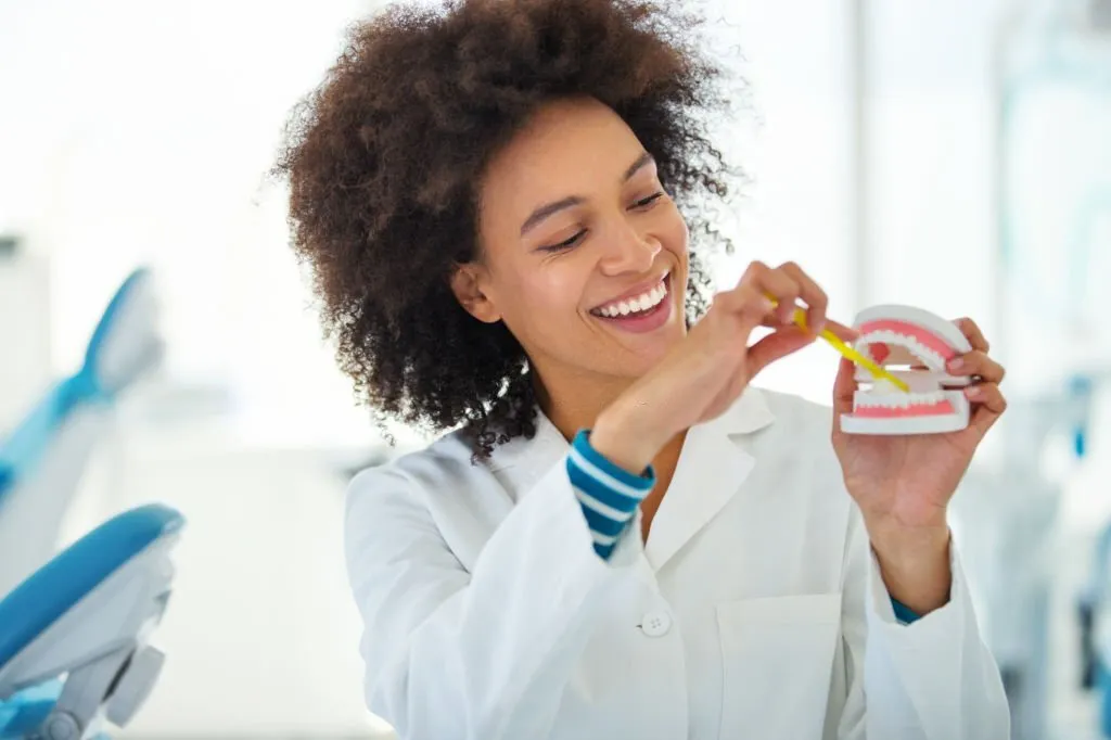 Teeth brushing tutorial example by a doctor