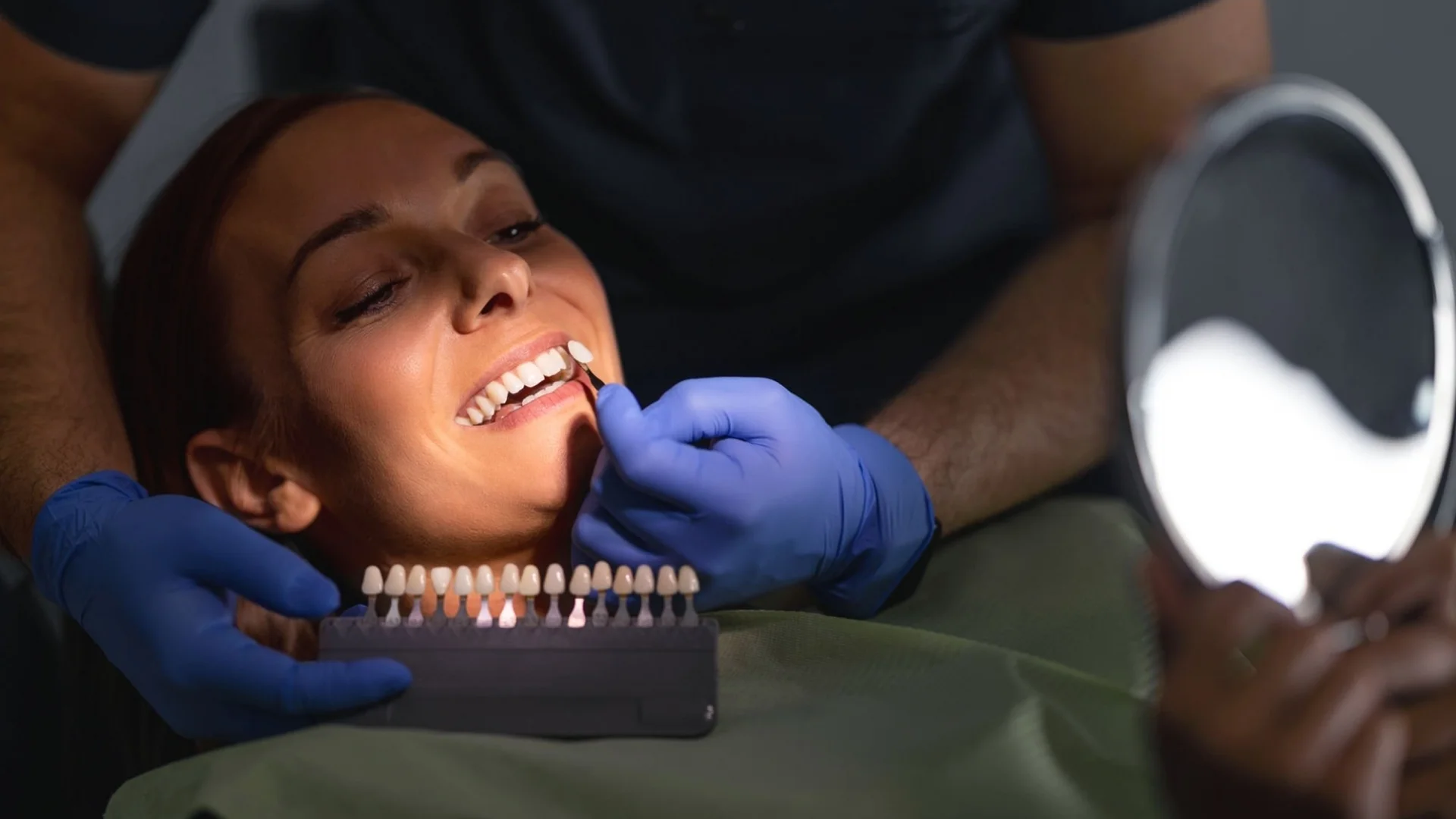 woman sampling veneers at the dentist